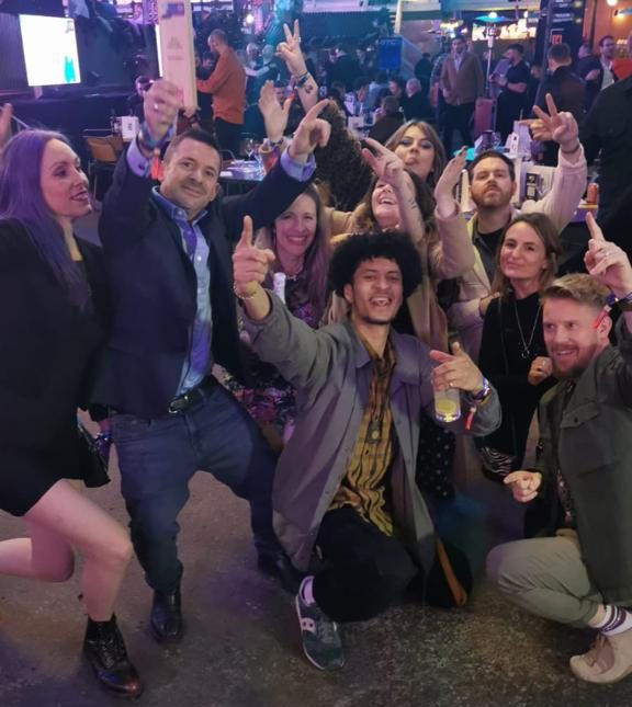 The Boomtown and AF Live team holding an award