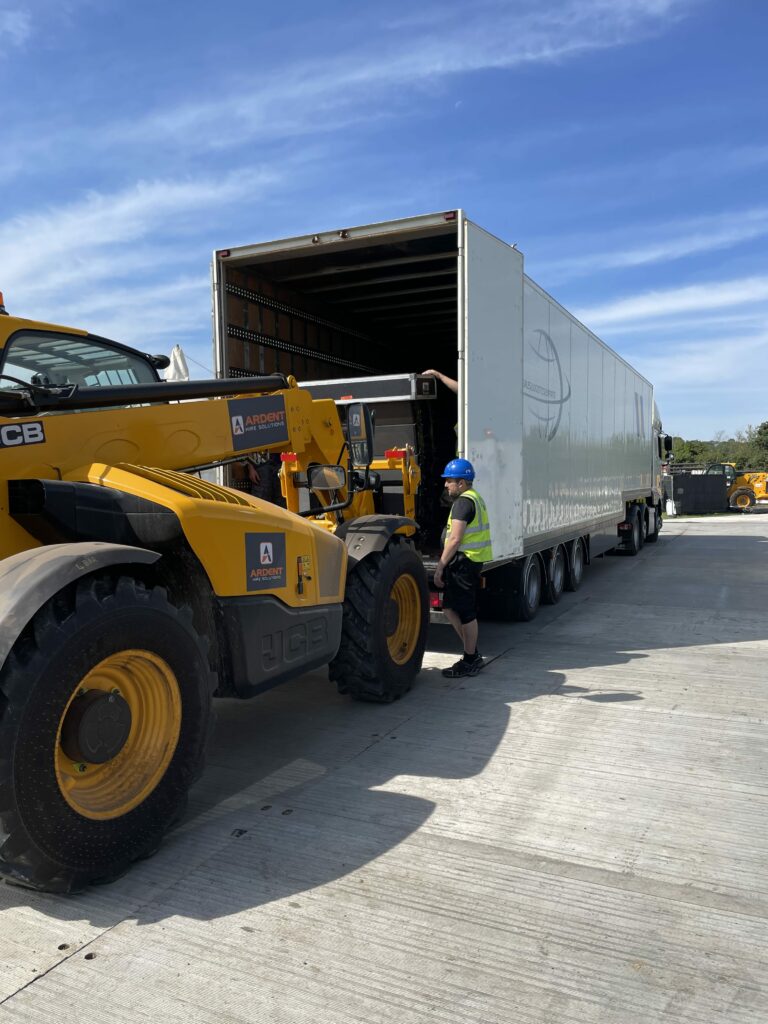 Man loading truck with equipment